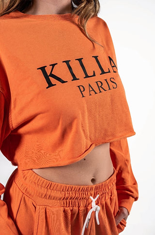 Short orange sweat-shirt and sweatpants